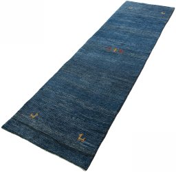 Corner detail of New Persian Gabbeh rug showing border pattern and Wool pile