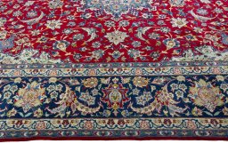 Corner detail of 2000s Najafabad rug showing border pattern and Wool pile
