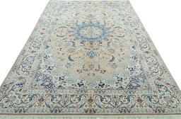 Surface texture of 2000s Nain rug with natural Wool and intricate pattern