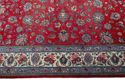 Corner detail of 2000s Sarough rug showing border pattern and Wool pile