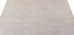 Backside of handmade New Morocco rug showing knot structure and weave density