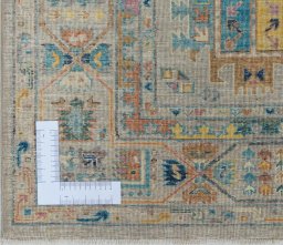 Corner detail of New Samarkand rug showing border pattern and Wool pile