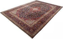 Corner detail of 2000s Kashan rug showing border pattern and Wool pile