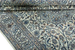 Close-up detail of 2000s Kashmar rug from Iran / Persia showing Wool weave