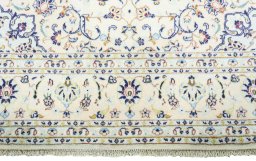 Full view of New Kashan rug from Iran / Persia, 294 × 200 cm in Beige tones
