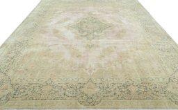 Surface texture of 1950s Vintage rug with natural Wool and intricate pattern