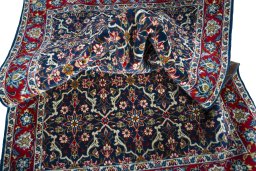 Corner detail of 2000s Najafabad rug showing border pattern and Wool pile