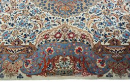 Corner detail of 2000s Kashmar rug showing border pattern and Wool pile