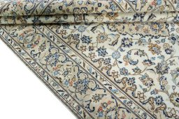 Close-up detail of 2000s Kashan rug from Iran / Persia showing Wool weave