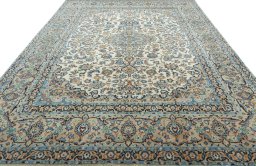 Surface texture of 2000s Yazd rug with natural Wool and intricate pattern
