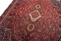 Backside of handmade 2000s Shiraz rug showing knot structure and weave density