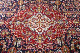 Central medallion detail of 2000s Kashan rug from Iran / Persia