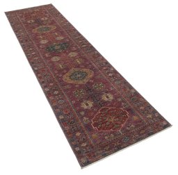 Corner detail of New Kazak rug showing border pattern and Wool pile