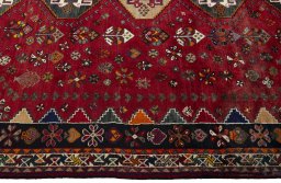 Full view of 2000s Shiraz rug from Iran / Persia, 330 × 229 cm in Red tones