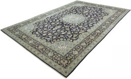 Corner detail of 2000s Kashan rug showing border pattern and Wool pile