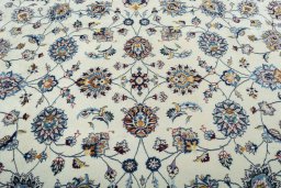 Central medallion detail of 2000s Mashad rug from Iran / Persia