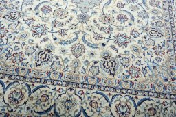 Close-up detail of 2000s Nain rug from Iran / Persia showing Wool weave