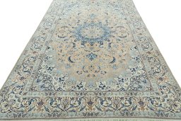 Surface texture of 2000s Nain rug with natural Wool and intricate pattern