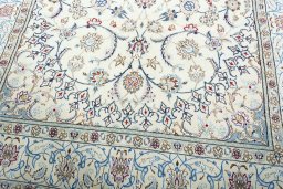 Close-up detail of 2000s Nain rug from Iran / Persia showing Wool weave