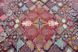 Central medallion detail of 2000s Kashan rug from Iran / Persia