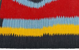 Close-up detail of New Kilim Sofre rug from Turkey showing Wool weave