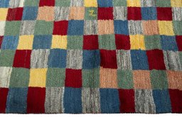 Close-up detail of 2000s Persian Gabbeh rug from Pakistan showing Wool weave