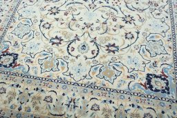 Close-up detail of 2000s Nain rug from Iran / Persia showing Wool weave