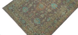 Backside of handmade New Farahan rug showing knot structure and weave density