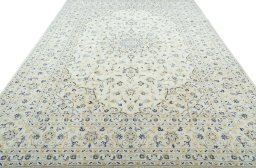 Surface texture of 2000s Kashan rug with natural Wool and intricate pattern