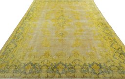Surface texture of 1950s Vintage rug with natural Wool and intricate pattern