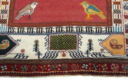 Central medallion detail of 2000s Persian Gabbeh rug from Iran / Persia