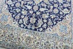 Close-up detail of New Nain rug from Iran / Persia showing Wool weave