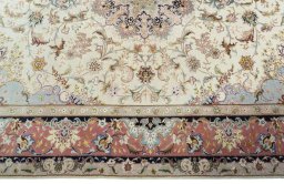 Corner detail of New Tabriz 50/60/70 Raj rug showing border pattern and Cork pile