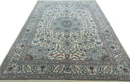 Surface texture of 2000s Kashmar rug with natural Wool and intricate pattern