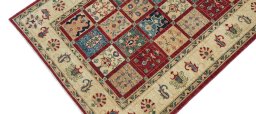 Backside of handmade New Farahan rug showing knot structure and weave density