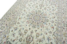 Backside of handmade New Kashan rug showing knot structure and weave density