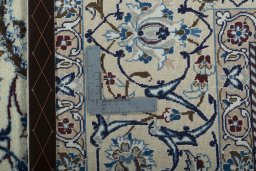 Backside of handmade 2000s Nain rug showing knot structure and weave density