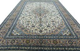 Surface texture of 2000s Kashan rug with natural Wool and intricate pattern
