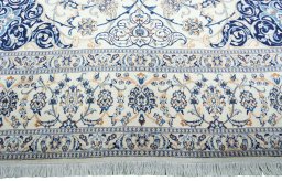 Full view of 2000s Nain rug from Iran / Persia, 490 × 344 cm in Beige tones
