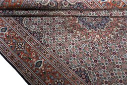 Close-up detail of 2000s Moud rug from Iran / Persia showing Wool weave
