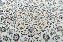 Central medallion detail of 2000s Kashan rug from Iran / Persia