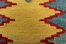 Backside of handmade New Modern Design rug showing knot structure and weave density