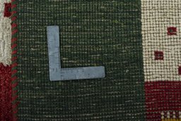 Close-up detail of 2000s Persian Gabbeh rug from Pakistan showing Wool weave