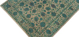 Backside of handmade New Farahan rug showing knot structure and weave density