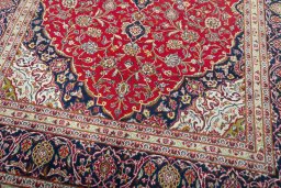 Close-up detail of 2000s Kashan rug from Iran / Persia showing Wool weave