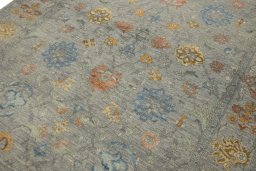 Backside of handmade New Mahli rug showing knot structure and weave density