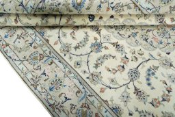 Close-up detail of New Kashan rug from Iran / Persia showing Wool weave