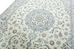 Backside of handmade 2000s Nain rug showing knot structure and weave density