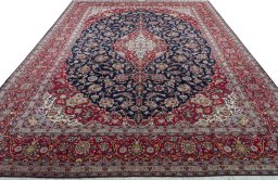 Surface texture of 2000s Kashan rug with natural Cork and intricate pattern