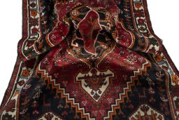 Close-up detail of 2000s Shiraz rug from Iran / Persia showing Wool weave
